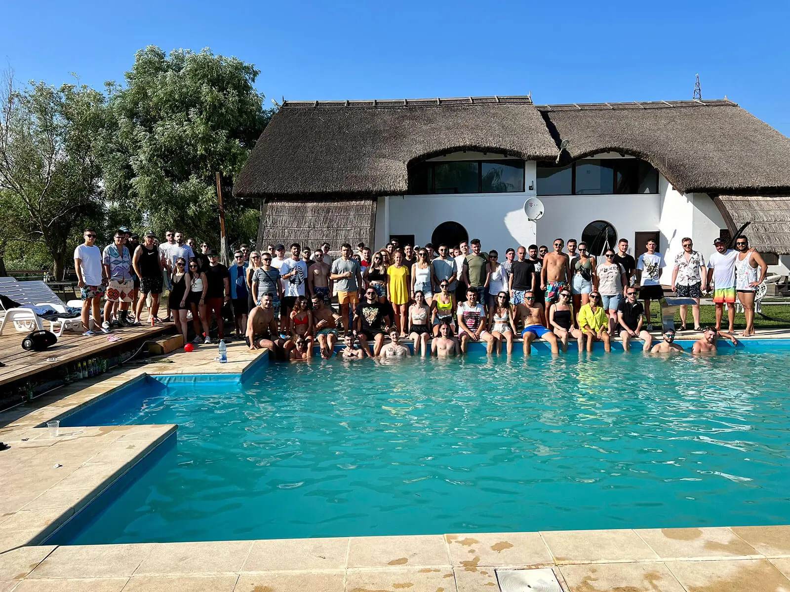 Web developers and digital specialists at a pool party