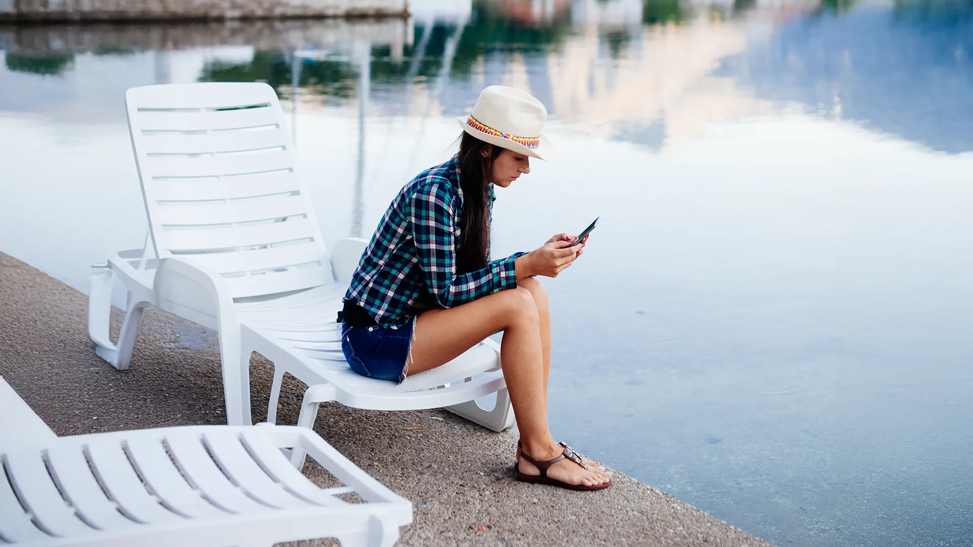 Person checking account security on their phone during a vacation trip